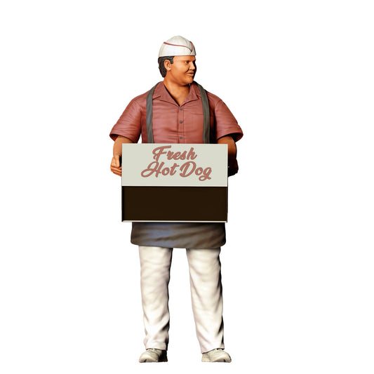 Diorama modelářství produktová fotografie 0: Stánkař s hotdogovou krabicí – figura v zástěře a čepici (Ref. č. 410)