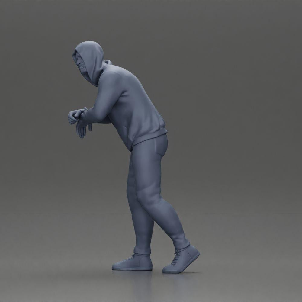 Imagem do produto de modelismo diorama 11: Figura de diorama: Homem com capuz, mãos no carro, ligeiramente inclinado para a frente (Ref Nr. A115)