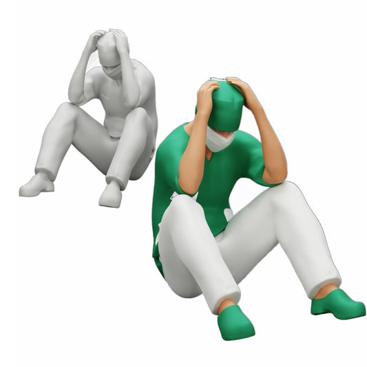 Foto del prodotto diorama modellistico 0: Chirurgo pensieroso seduto a terra dopo un intervento fallito (Rif. Nr. A31)