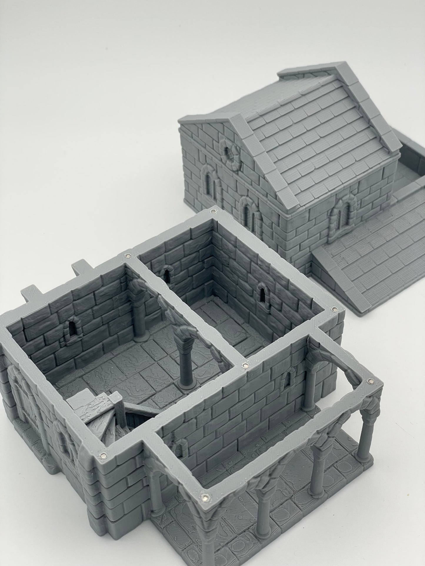 Produktová fotografie Tabletop 28mm Tisk pokračuje dál (TPGEO) 0: Středověký obytný dům A - Kamenná budova z lidského království Gonthan - Choditelný terén