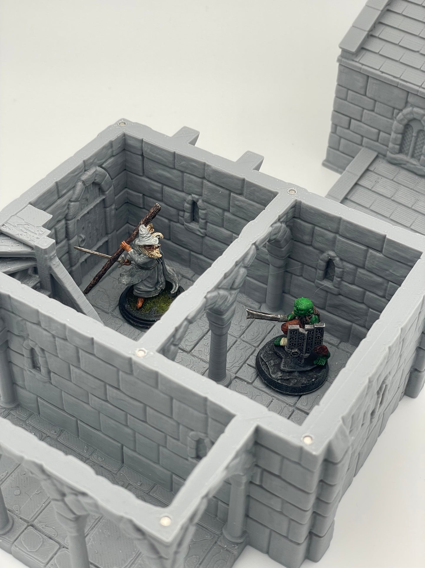 Produktová fotografie Tabletop 28mm Tisk pokračuje dál (TPGEO) 0: Středověký obytný dům A - Kamenná budova z lidského království Gonthan - Choditelný terén