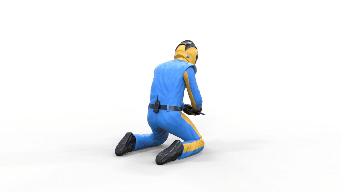 Produktfoto Diorama und Modellbau Miniatur Figur: Pit Crew - Mechaniker beim Radwechsel 1