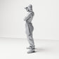 Diorama Modellbau Produktfoto 1: Stehende Figur: Person mit Basecap, kurzem Top, weiter Hose & Sneakers, Arme verschränkt (B033)