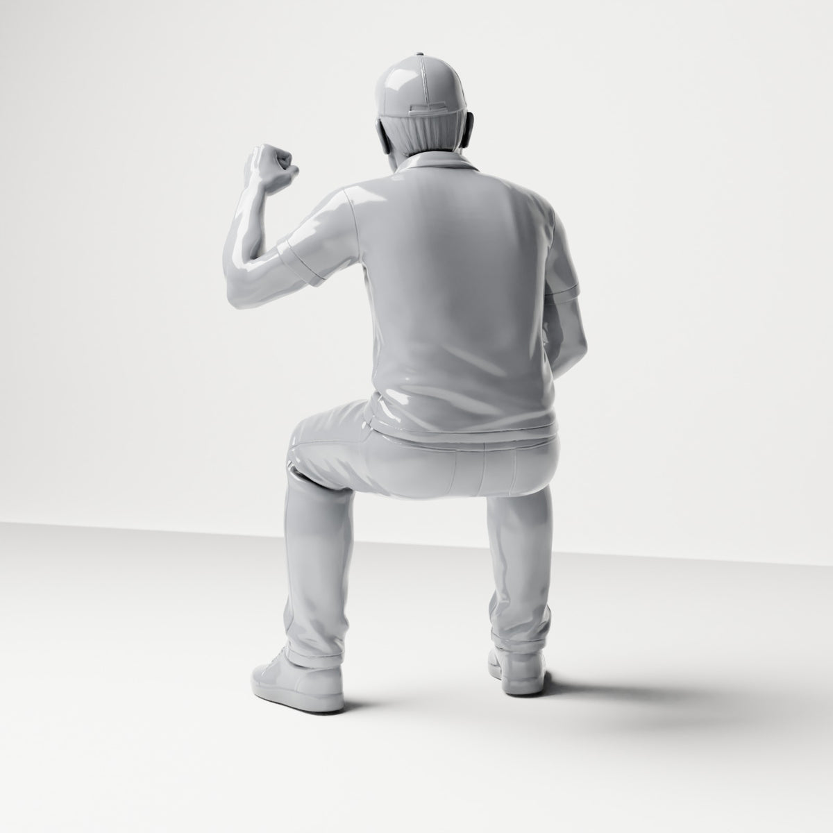 Diorama Modellbau Produktfoto 2: Sitzende Figur: Männlicher Zuschauer mit erhobener geballter Faust (B065)