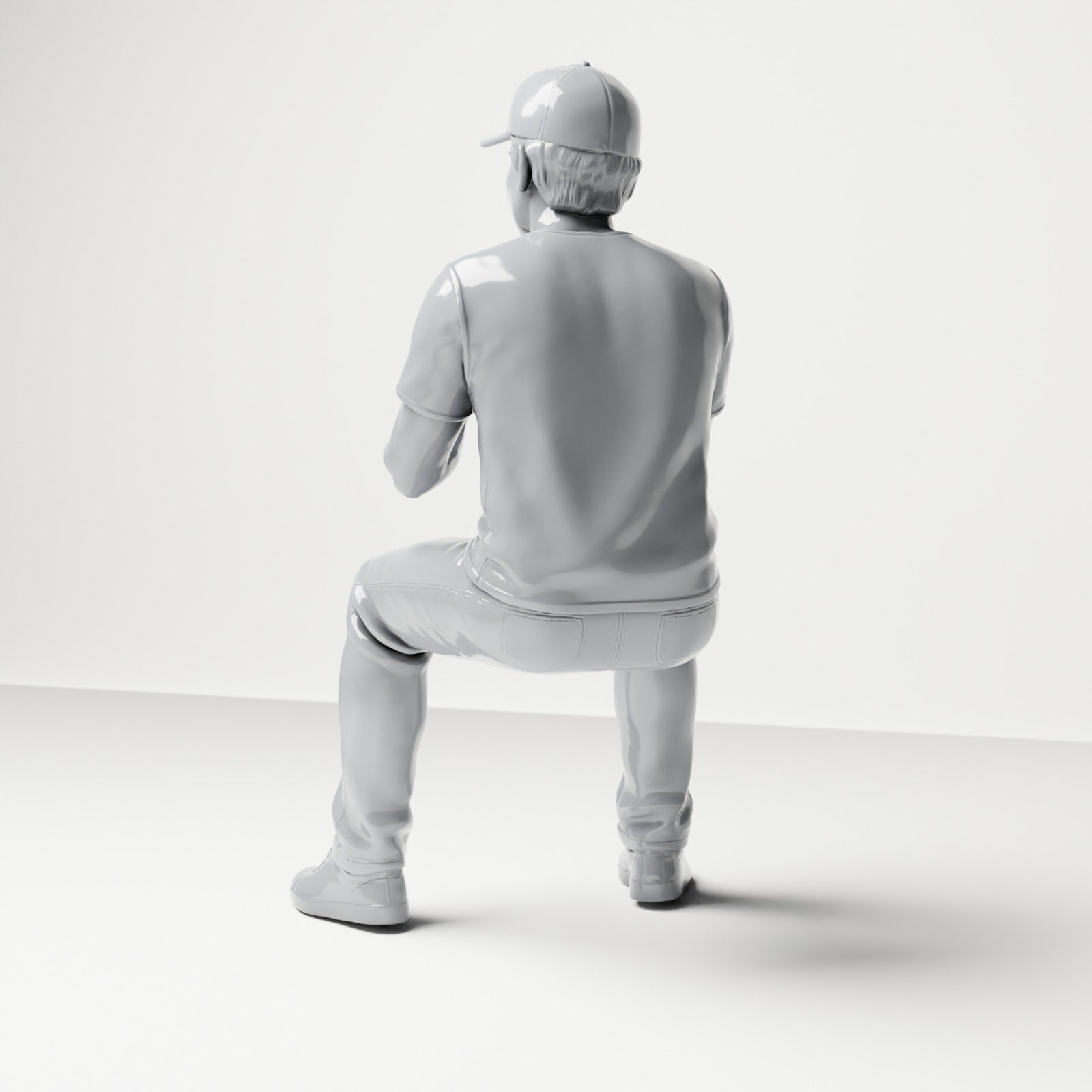 Foto prodotto per diorama e modellismo 2: figura seduta: spettatore maschile con berretto e mani unite (B068)