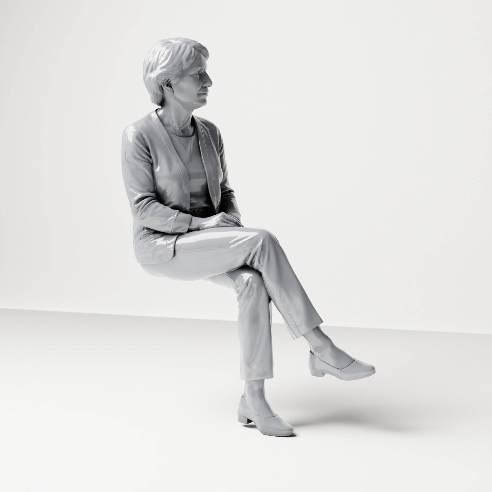Diorama modelářství produktová fotografie 3: Sedící figurka: divačka s překříženýma nohama a sepjatýma rukama (B069)