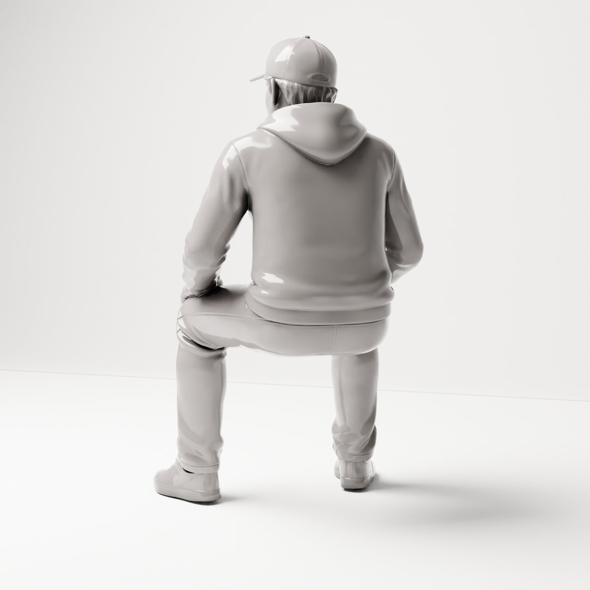 Sitzende Figur: Mann mit Kappe & Kapuzenpullover (B070) - Rueckansicht