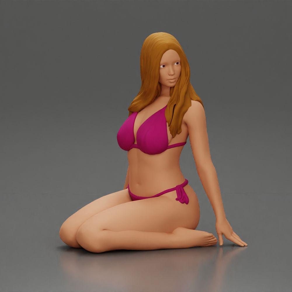 Diorama modelarstwo produktowe zdjęcie 0: Klęcząca miniaturowa figura kobiety w bikini, siedząca na płaskiej podstawie - plażowe diorama (Ref Nr. A83)