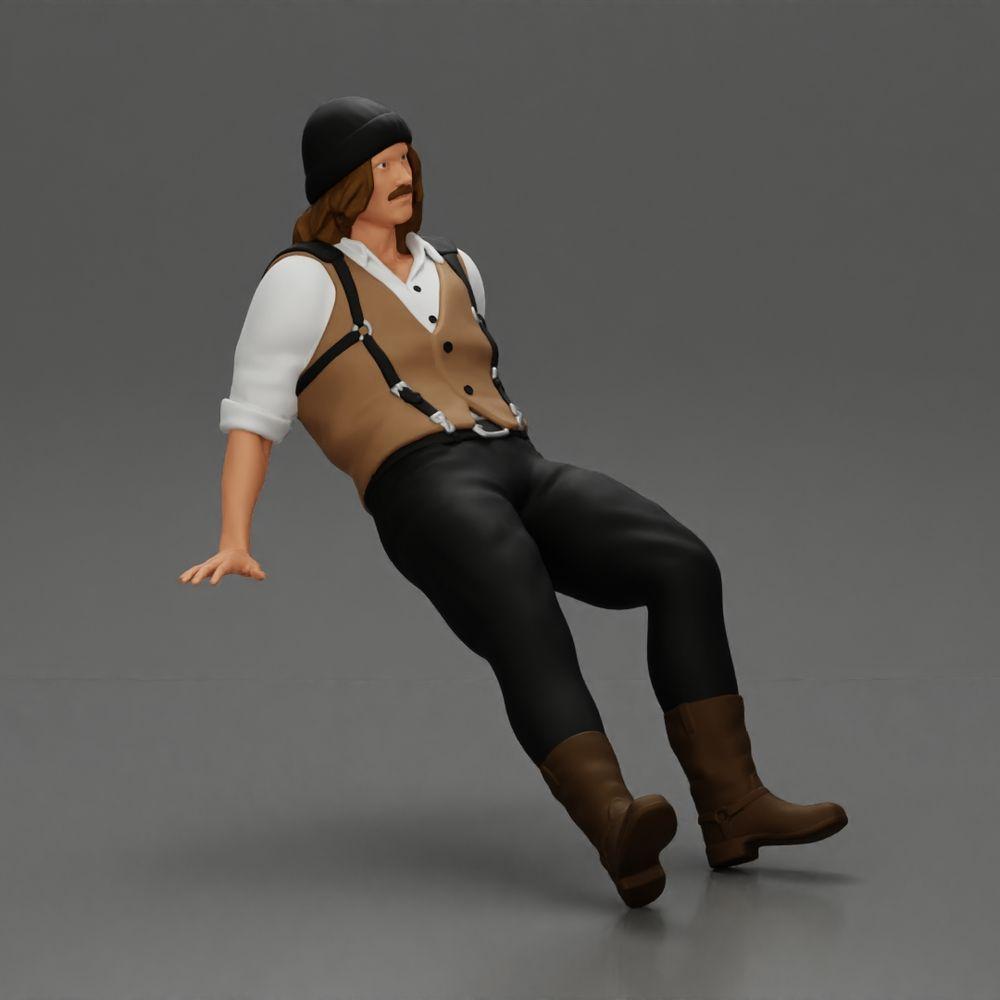 Diorama modellismo foto prodotto 1: Miniatura seduta, uomo in abbigliamento storico con cappello e bretelle (Ref Nr. A84)