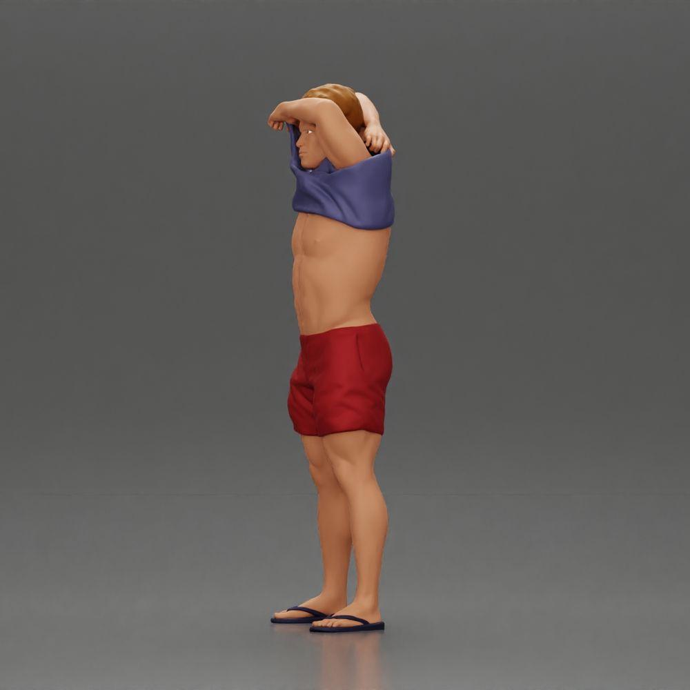 Foto do produto de modelismo de diorama 5: Miniatura em pé: homem musculoso de calções puxando a t-shirt sobre a cabeça (Ref Nr. A90)