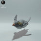 Produktfoto Tierfigur Animal Den Miniatures 1: Meerestier Tierfigur: Felsenpinguin - schwimmend (22_12_10)