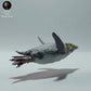 Produktfoto Tierfigur Animal Den Miniatures 3: Meerestier Tierfigur: Felsenpinguin - schwimmend (22_12_10)