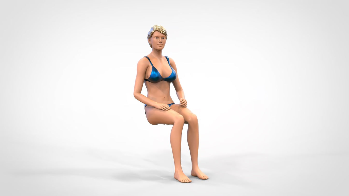Produktfoto  0: Frau im Bikini - sitzend