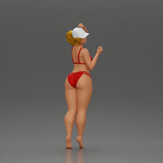 Foto prodotto di modellismo per diorama 0: figura in piedi: donna in bikini con cappellino e braccio alzato (a160)