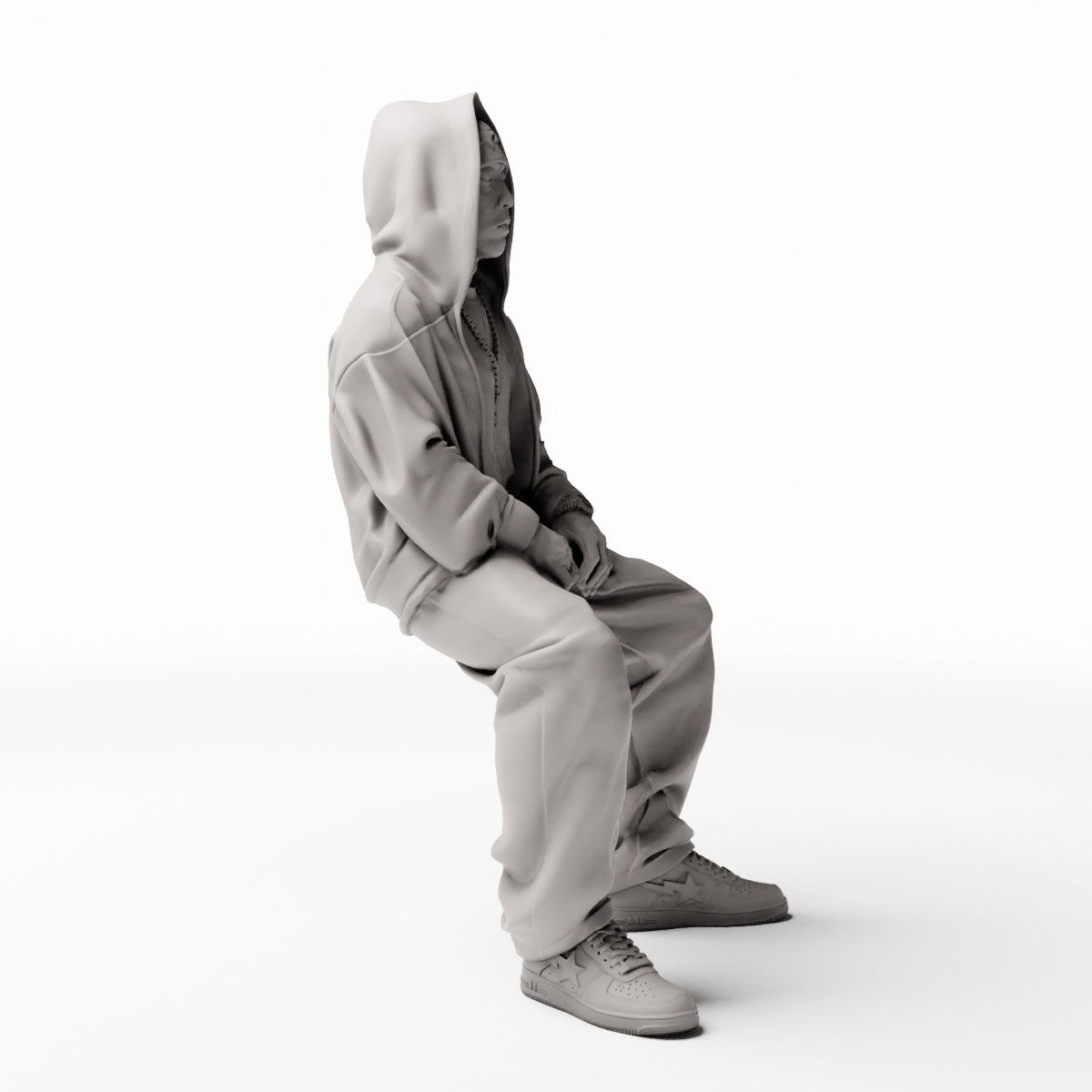 Diorama Modellbau Produktfoto 0: Sitzende Figur: Mann in Hip-Hop Kleidung mit Kapuzenjacke, Mütze und weiter Hose (Ref. Nr. 531)